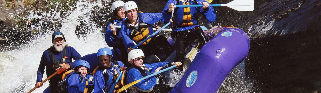 students whitewater rafting